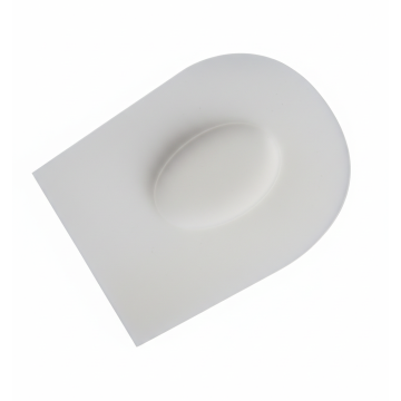 Dettaglio dell'inserimento della tallonetta in silicone con scarico centrale nella calzatura per il trattamento della tallonite.